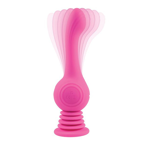 A photo of the Evolved Gyro Vibe against a white background. Multiple images of the Gyro Vibe in motion have been superimposed over a single image to show how the toy wiggles back and forth. | Kinkly Shop