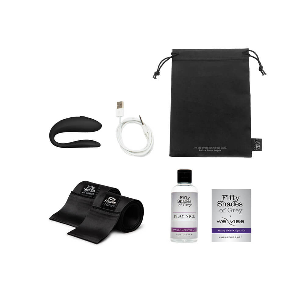 Everything that's included in the Fifty Shades of Grey Moving as One Kit. There's the We-Vibe vibrator, the charging cable, the storage bag, the Fifty Shades of Grey branded satin ties, the Vanilla Massage Oil, and a quick start guide. | Kinkly Shop
