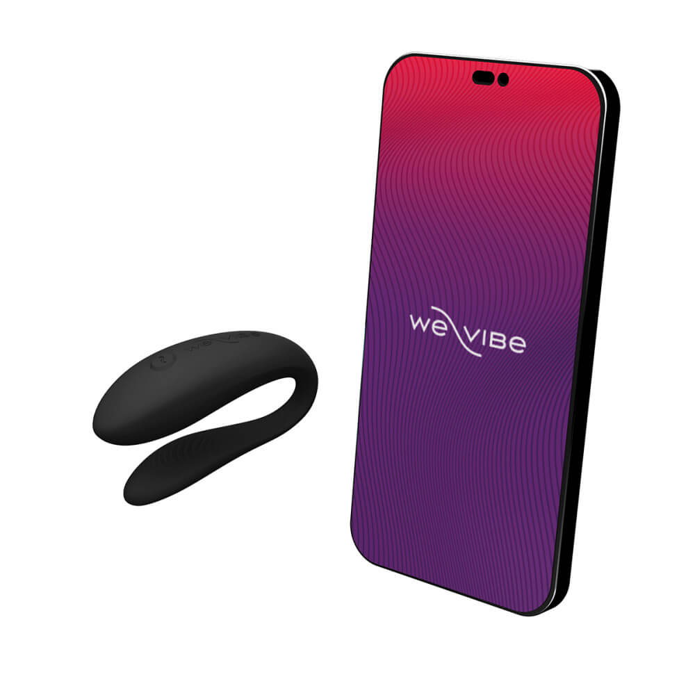 The We-Vibe Sync Lite sitting next to a cell phone that's open to the We-Vibe app to control the vibrator. | Kinkly Shop