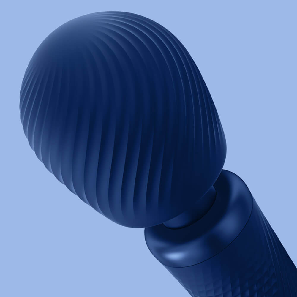 Close-up of the unique, swirled, texture of the head of the Fun Factory VIM. It has deep grooves within the head that come together to a flat, untextured surface on the very top of the toy's head. | Kinkly Shop