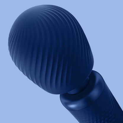 Close-up of the unique, swirled, texture of the head of the Fun Factory VIM. It has deep grooves within the head that come together to a flat, untextured surface on the very top of the toy's head. | Kinkly Shop