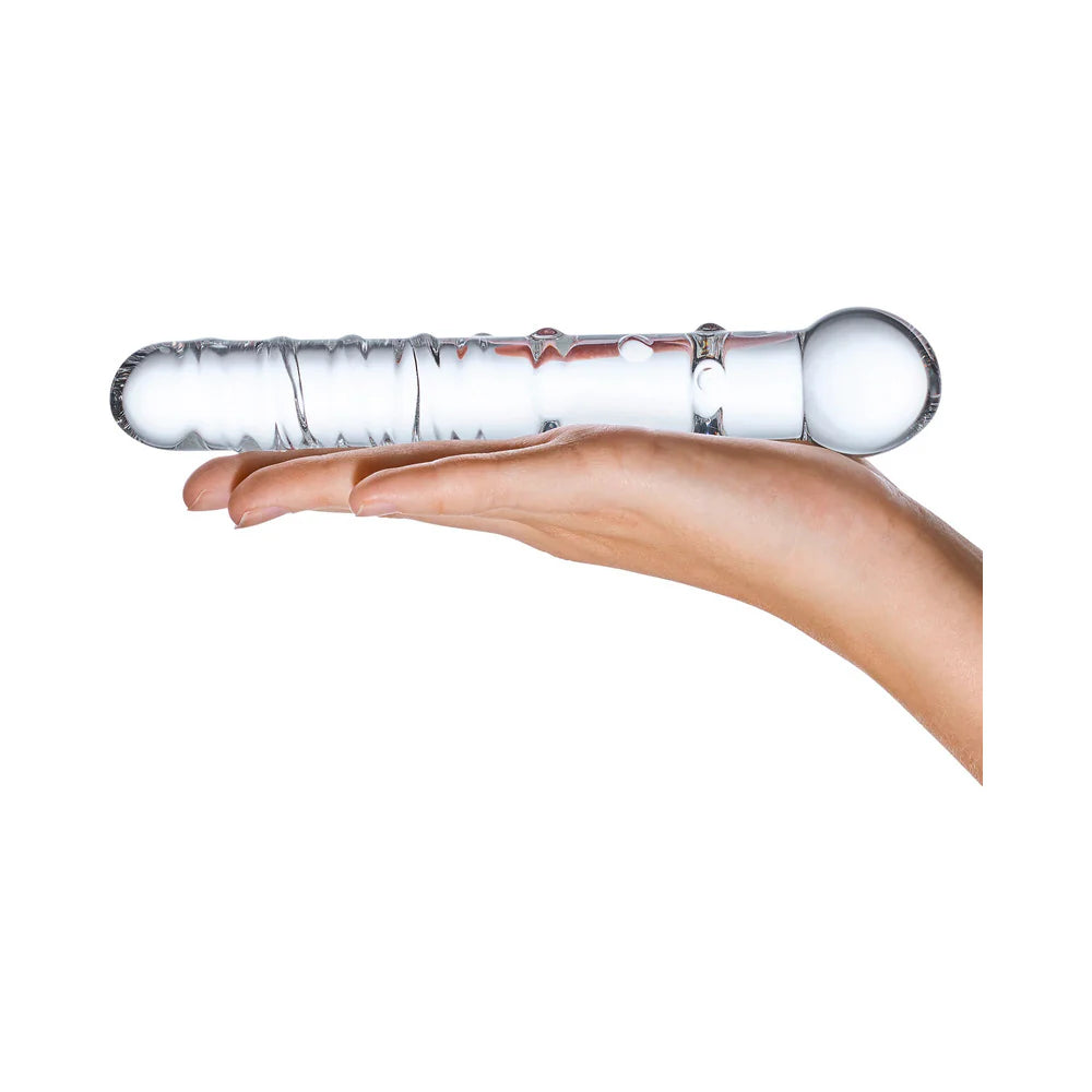 A palm is held flat with the Glas Callisto dildo on top of it. The dildo is slightly longer than the person's outstretched palm. | Kinkly Shop