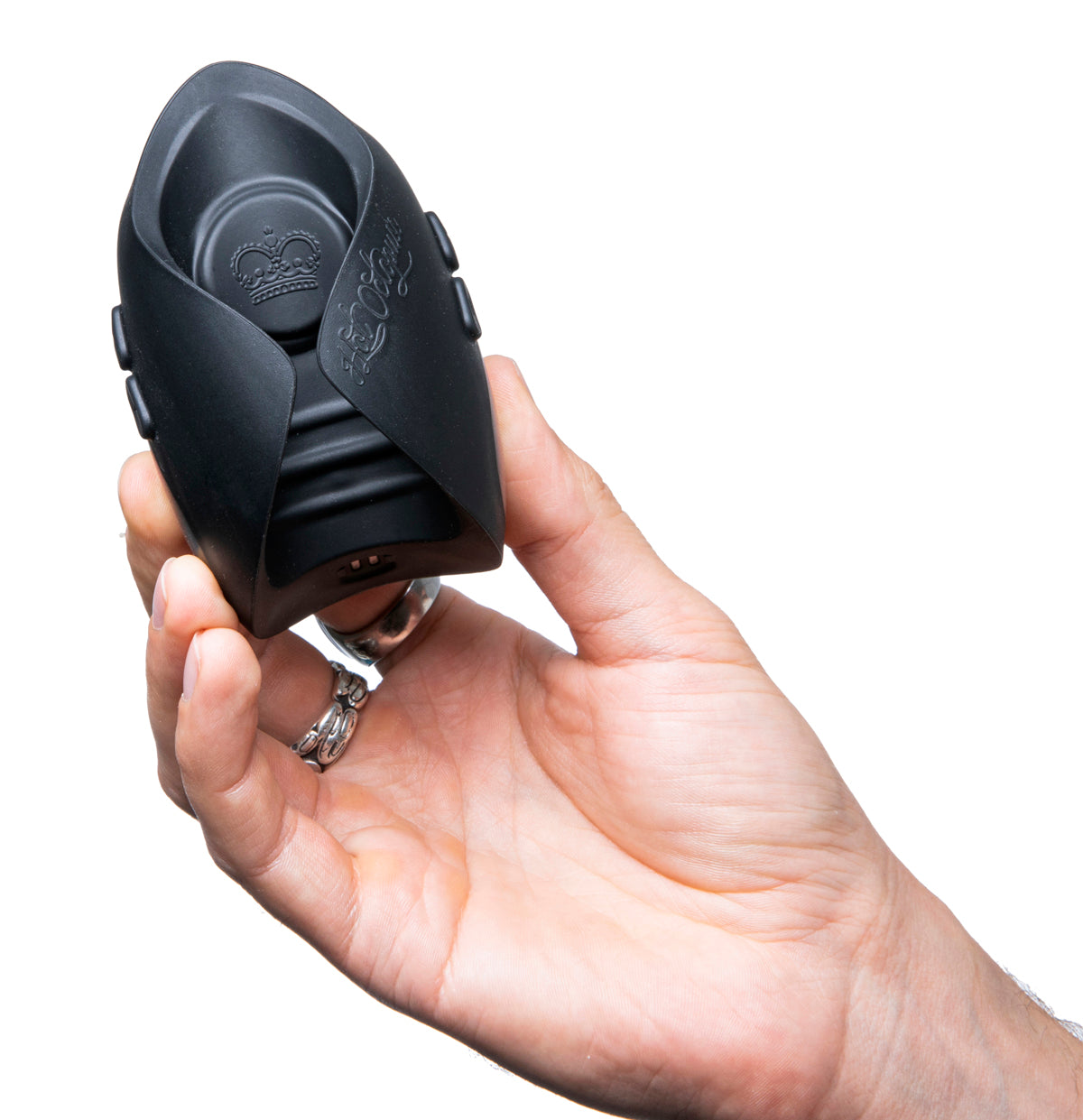 A hand holds the Hot Octopuss Pulse Solo Interactive vibrator. It looks like it would fit really comfortably between the fingers. | Kinkly Shop