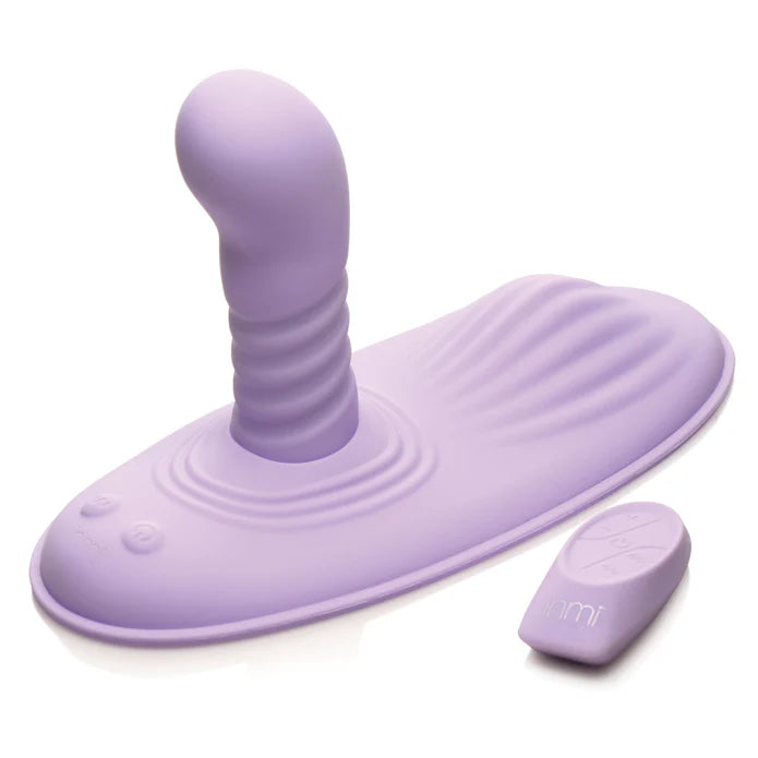 Inmi Thrust N' Grind and its remote in front of a plain white background | Kinkly Shop