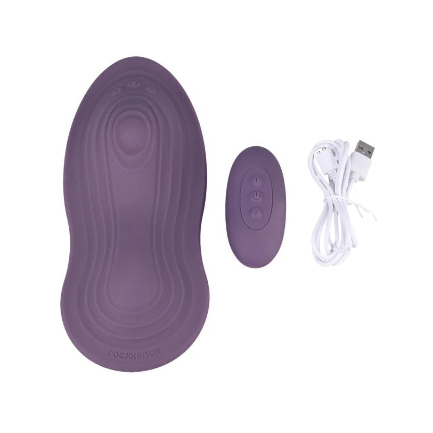 iThrob iRide Pleasure Seat shown next to the wireless remote and charging cable that comes with it. | Kinkly Shop