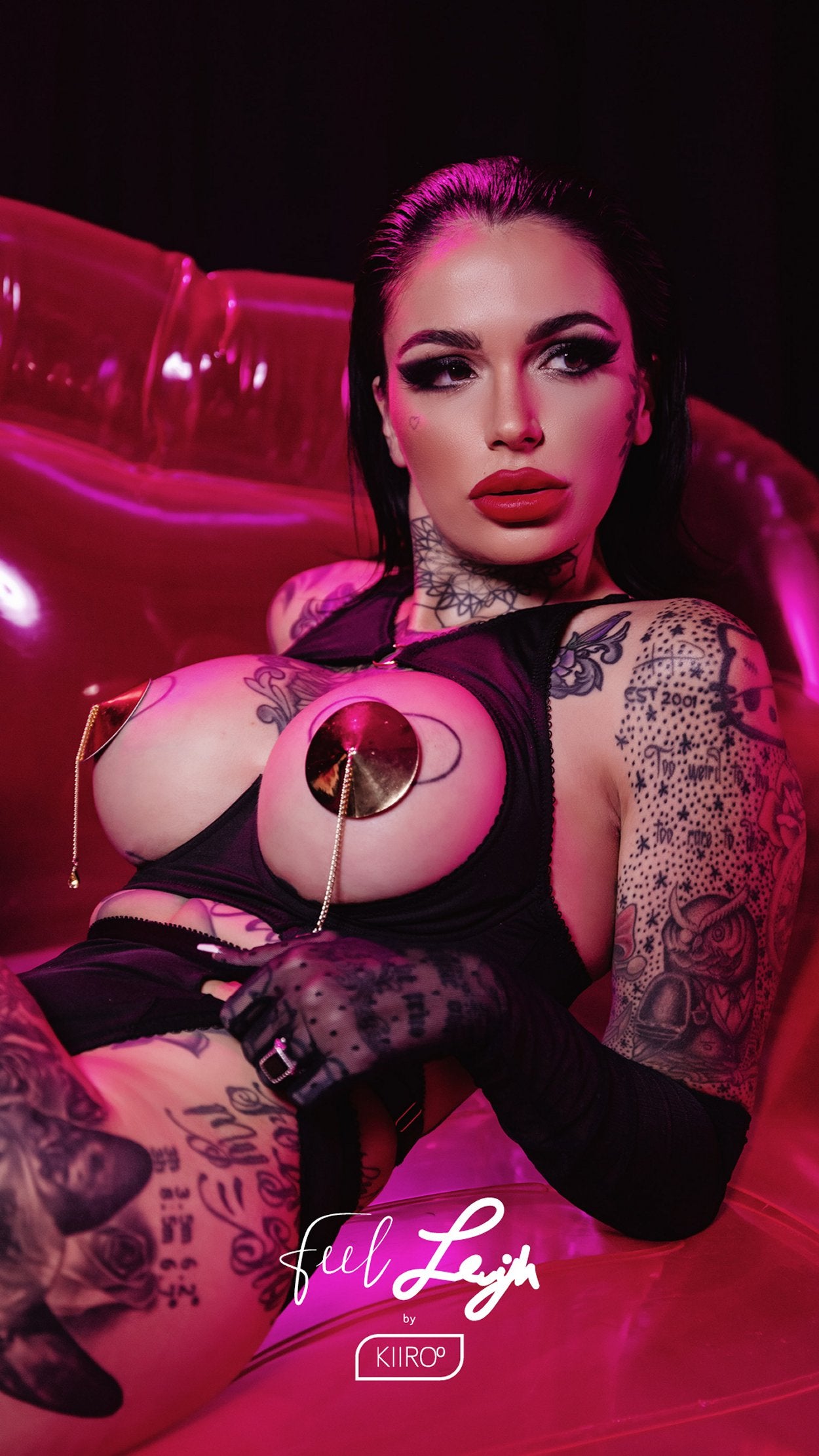 Leigh Raven is wearing pasties and looking seductively at the camera. | Kinkly Shop