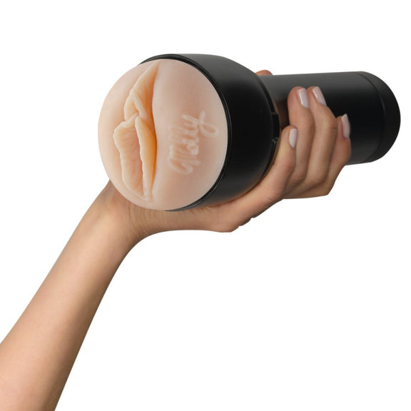 A hand holds the FeelStars FeelMolly Stroker. It looks like it's very comfortable and easy to grip. | Kinkly Shop