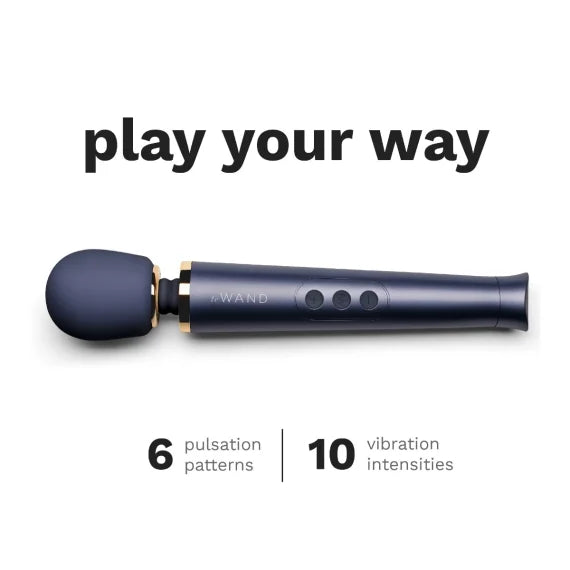 An image of the Le Wand Petite Rechargeable in navy blue has the text "Play your Way. 6 pulsation patterns. 10 vibration intensities." written on it. | Kinkly Shop