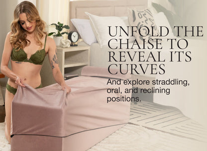 A person is pulling the outermost slipcover off the Liberator Aria Flip Chaise while its folded into its bench. The slipcover makes it look like a bedroom ottoman. Text on the image reads "Unfold the chaise to reveal its curves. And explore straddling, oral, and reclining positions." | Kinkly