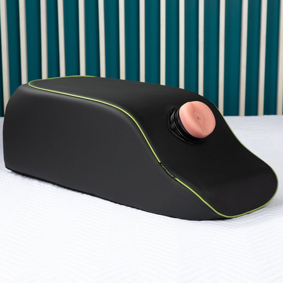 The Liberator On a Mission in front of a striped blue background. A Fleshlight is stuffed inside of the sex toy mount hole, protruding as a hands-free way to use the Fleshlight. | Kinkly Shop