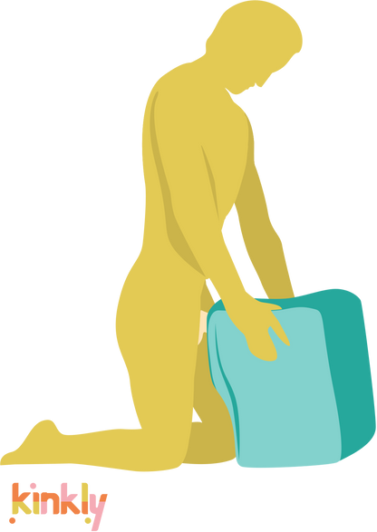 Illustration showing how the Liberator Fleshlight Top Dog is used. A person is kneeling in front of the square shape of the Liberator Fleshlight Top Dog. The Top Dog has a Fleshlight in it. The person is pressing their length into the Top Dog while holding the Top Dog, simulating doggy style sex. | Kinkly Shop