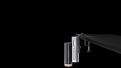 GIF shows the Lovense Solace Pro in its table clamp and fastened to a desk. The stroker has a full range of motion and can adjust to any angle when fastened to a desk. | Kinkly
