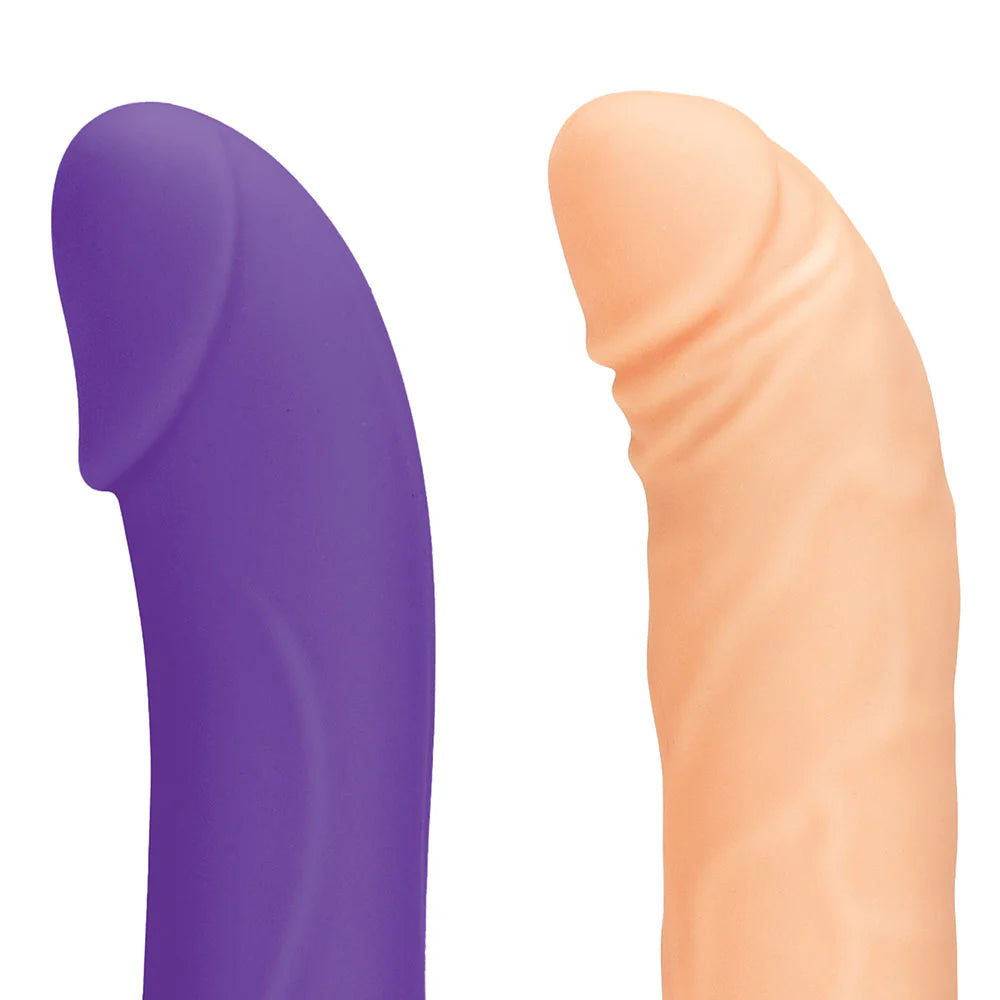 Close-up of the g-spot tips of the two included tips. One has a realistic design and tip and the other has a purple, less-realistic design. | Kinkly Shop