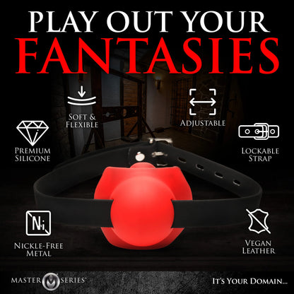 The Master Series Gag Order with icons and text surrounding the gag, showcasing the various features of the toy. Text reads: Soft & flexible, Adjustable, Premium silicone, Lockable strap, Nickel-free Metal, and Vegan Leather | Kinkly Shop