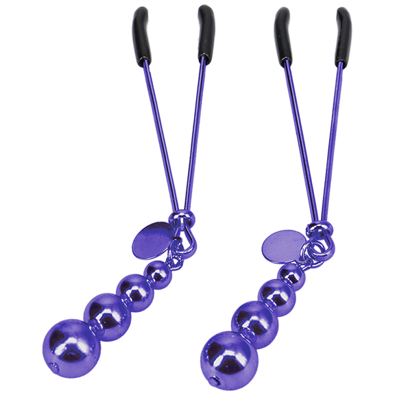 Close-up on the tweezer-style nipple clamps that are included within the The VIP Room BDSM Set | Kinkly Shop