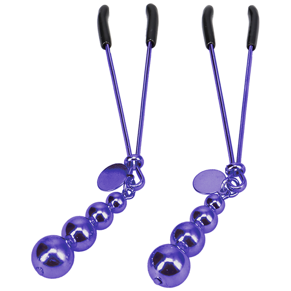 Close-up on the tweezer-style nipple clamps that are included within the The VIP Room BDSM Set | Kinkly Shop