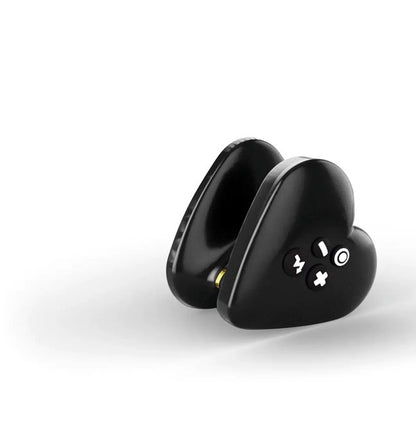 The Mystim Heart's Desire at an angle, showcasing its heart-shaped design, the four-buttons on one side, and the unique internal plastic thin diameter that makes it easy to grip. | Kinkly Shop