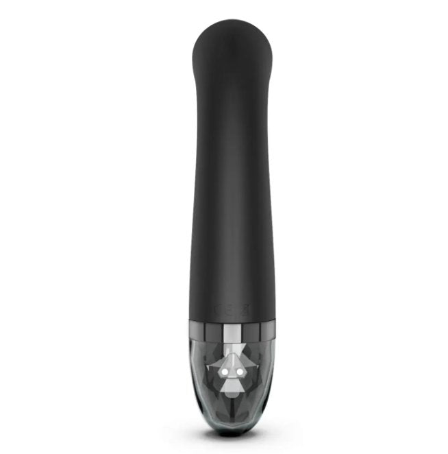 Backside of the Mystim Right on Ron. There are two metallic prongs at the base of the vibrator (opposite the control buttons) where the vibrator charges. | Kinkly Shop