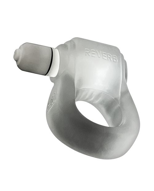 The Oxballs Glowdick in Clear Ice color. The LED light inside of the cock ring is lid up, showing a bright white light through the surface of the cock ring. | Kinkly Shop