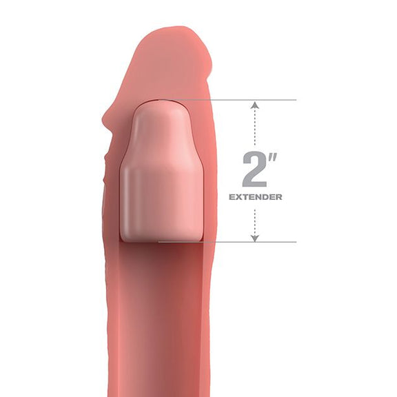 Cross-section of the inside of the X-Tensions Elite 6" Extension. This showcases the hollow interior of the strap-on extender, shown with the 2" Extender piece pushed at the tip of the hollow channel to make the extender work for a wider range of sizes. | Kinkly Shop