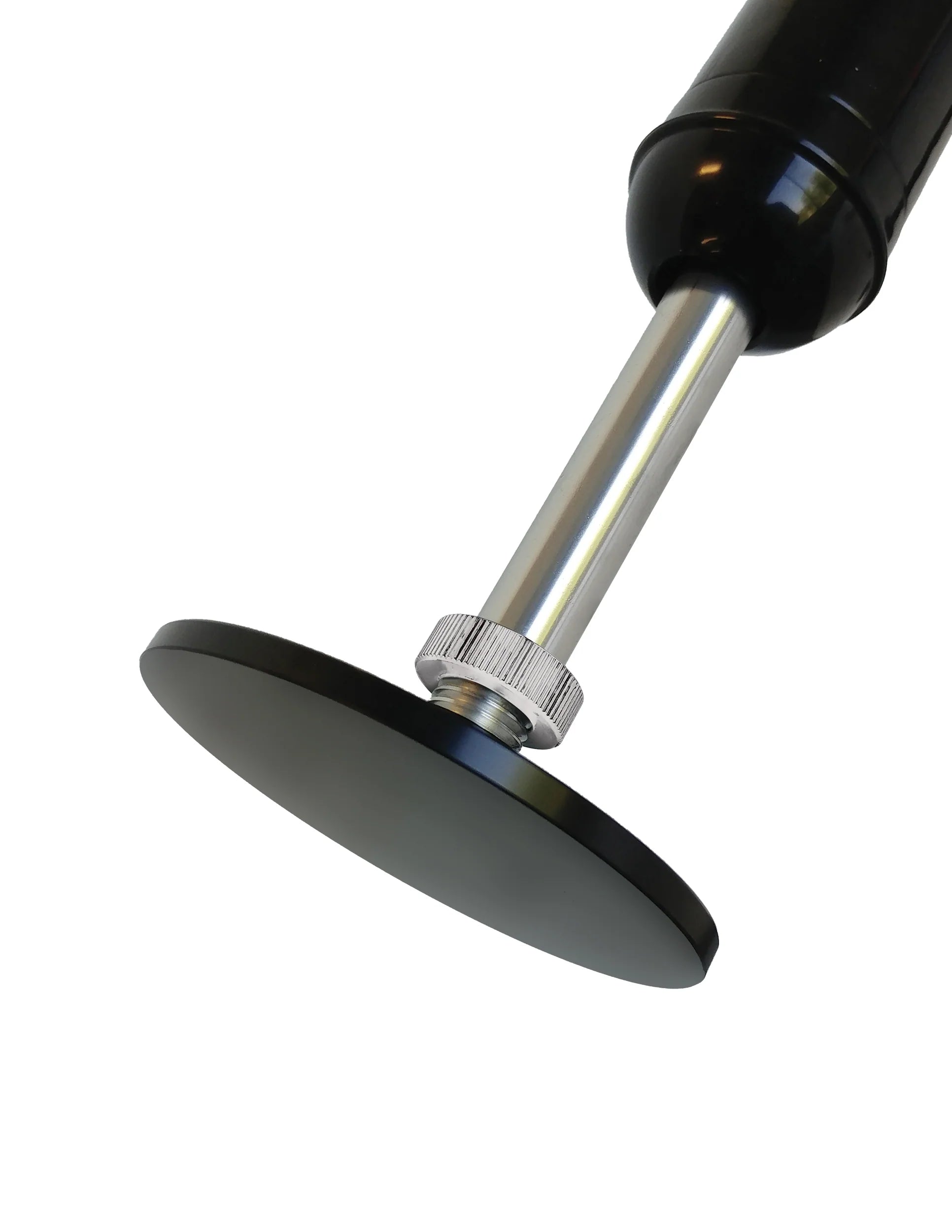 Close-up of the body dock plate of the Body Dock Pro Suction-Cup Machine. This is the flat, circular surface that allows any suction cup dildo to fasten to the sex machine. | Kinkly Shop