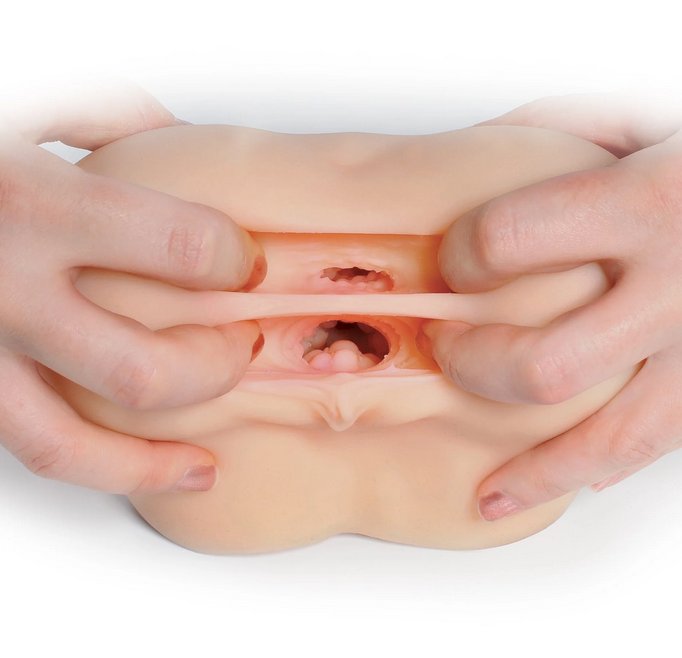 Two hands pry open the entrances of the Fuck Me Silly: To-Go Bubble Butt, showcasing the internal textures. The hands look surprisingly large on the stroker, like the stroker is only about a large as an outstretched hand. | Kinkly Shop