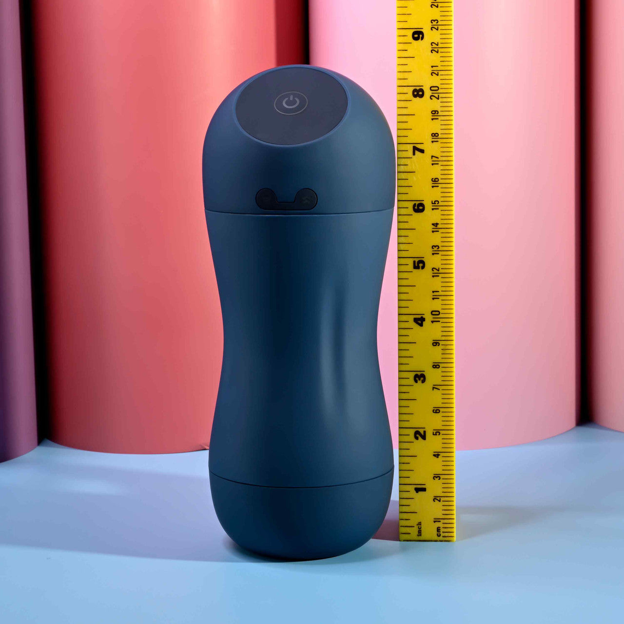 The Playboy Gusto shown next to a measuring tape. The stroker is about 8.5" tall. | Kinkly Shop