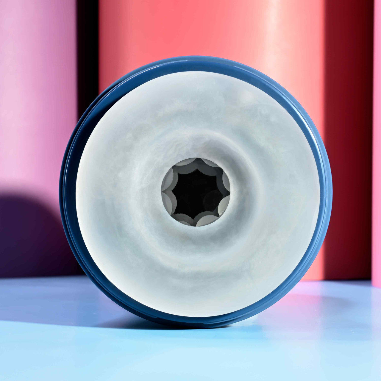 Close-up down the tunnel of the Playboy Gusto. The stroker has an internal texture that runs all throughout its interior. | Kinkly Shop