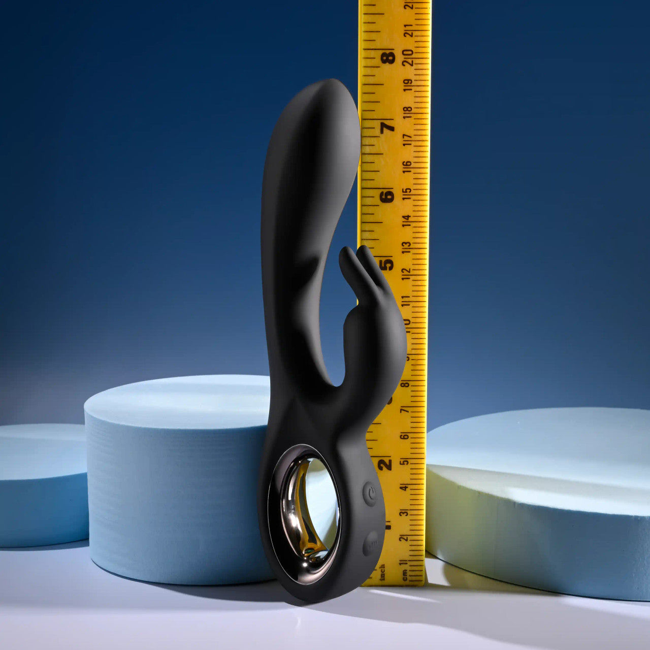 The Playboy Late Night Bunny stands up right next to a yellow tape measure. It's about 7.5" in total height. | Kinkly Shop