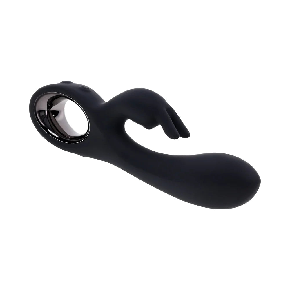 The lays on its side at a 3/4ths angle, showcasing its rabbit vibrator design. | Kinkly Shop