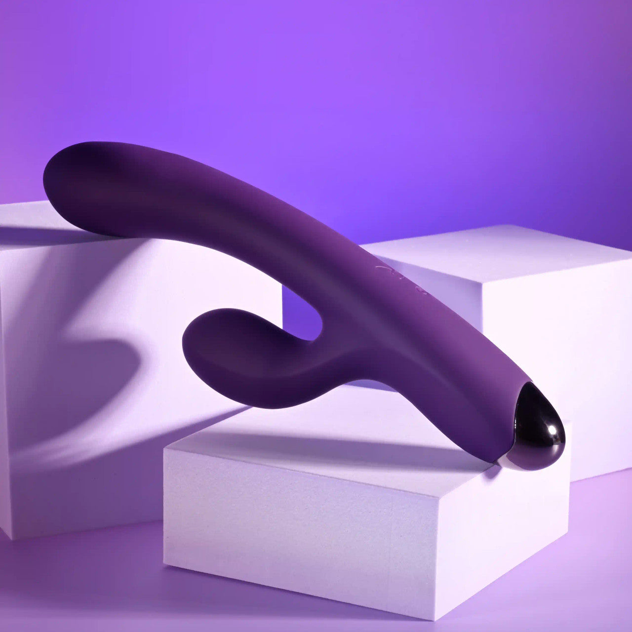 The Playboy New Crush with a focus on its shiny hard base and the smooth design of the silicone. | Kinkly Shop