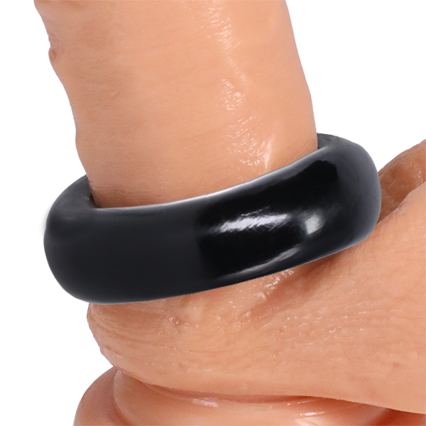 The Rock Solid The Donut 4X shown wrapped around the base of a realistic dildo | Kinkly Shop