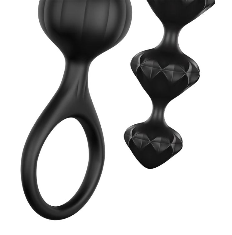 Close-up of the two different textures of the Satisfyer Love Beads. Both of them have a texture though the crystal-like texture of one of the strands is much more intense than the lightly lined beads of the other. | Kinkly Shop