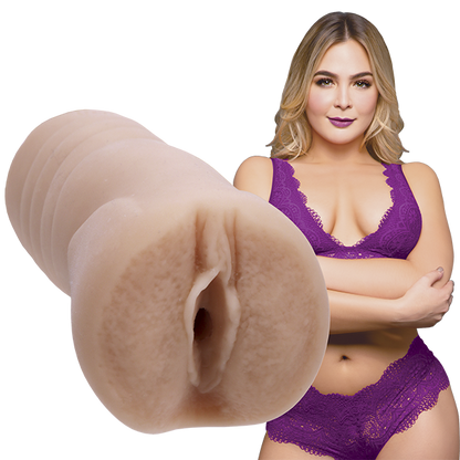 Blair Williams looks into the camera while wearing lingerie. The Signature Strokers Blair Williams stroker is shown next to the porn star. | Kinkly Shop