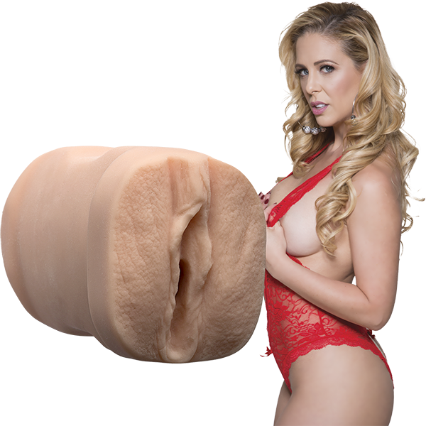 Cherie next to the Signature Strokers - Cherie Deville. The orifice of the stroker is modeled directly after Cherie's own vulva. | Kinkly Shop