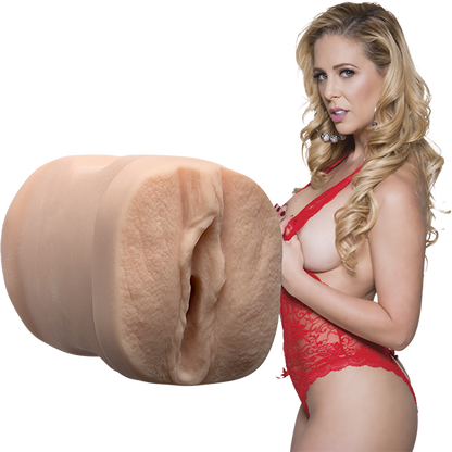 Cherie next to the Signature Strokers - Cherie Deville. The orifice of the stroker is modeled directly after Cherie's own vulva. | Kinkly Shop