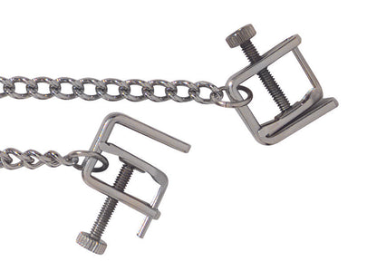 Close-up of the clamps on the Spartacus Press Nipple Clamps. They look like industrial clamp presses with twistable screws that cause the clamps to tighten up. | Kinkly Shop