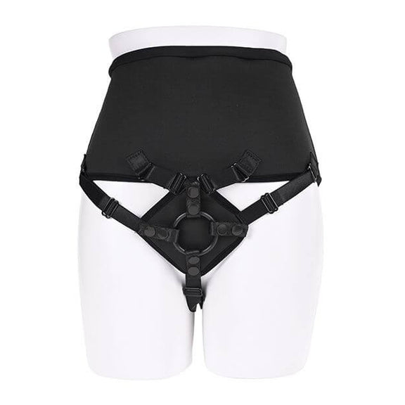 A mannequin wears the Sportsheets High Waisted Strap-On Corset Harness. The waist panel is long and tall and covers a lot of the mannequin's stomach. The front panel where the dildo goes looks nicely padded with multiple straps connecting it to the waist panel. | Kinkly Shop
