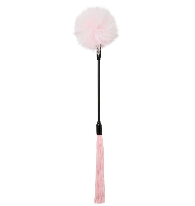 Sportsheets Whip and Tickle in Pink against a plain white background. It's a light, pastel pink. | Kinkly Shop