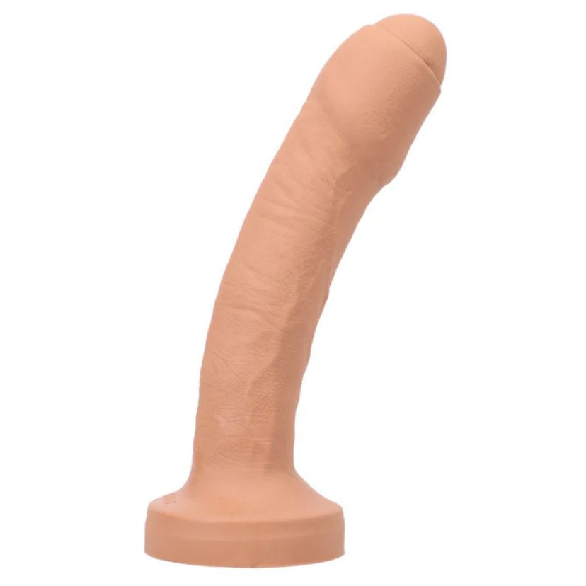 Tantus Uncut #2 dildo in Honey up against a plain white background | Kinkly Shop