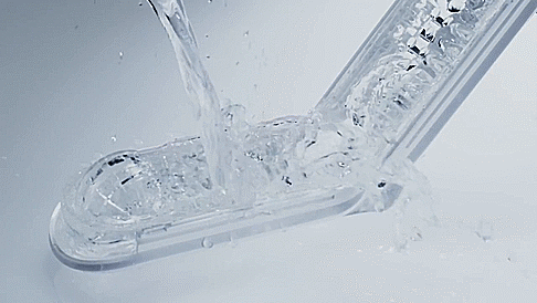 GIF showcases a person pouring a bunch of water on top of the opened up Tenga Flip Zero before placing it upright on its drying stand to allow the stroker to dry with the included stand. | Kinkly Shop