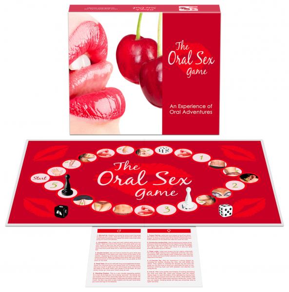 The packaging of the The Oral Sex Game laid out next to the board itself and all the game pieces, showing what the game looks like. | Kinkly