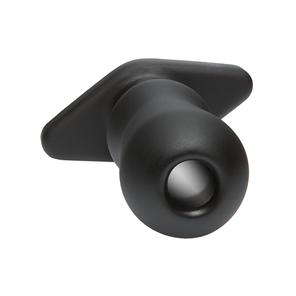 Close-up on the tip of the sex toy which shows that it has a hollow tunnel throughout the entire middle of the toy | Kinkly