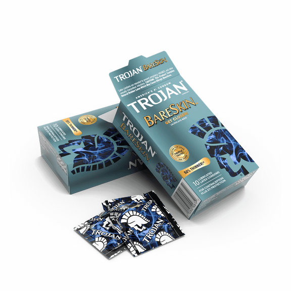 An opened box of 10 condoms with some of the individually-wrapped condoms scattered near it. | Kinkly