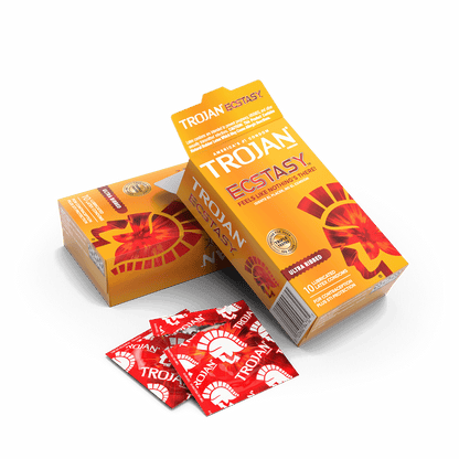 A box of the Trojan Ecstasy Ultra Ribbed condoms opened, red individually-wrapped condom packets scattered around the open box. | Kinkly Shop