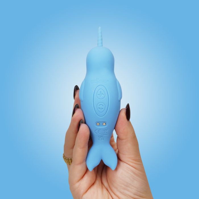 A person holds the Unihorn of the Sea up to the camera. The vibrator has two buttons on the bottom. | Kinkly Shop