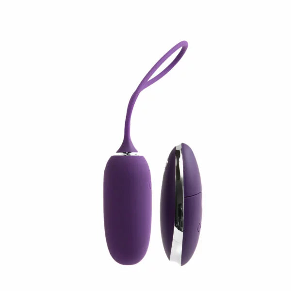 The VeDO Kiwi shown next to the included remote. The remote is slightly slimmer in thickness than the vibrator. It looks like the remote could easily hide in the palm of a hand. | Kinkly Shop