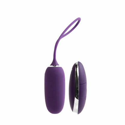 The VeDO Kiwi shown next to the included remote. The remote is slightly slimmer in thickness than the vibrator. It looks like the remote could easily hide in the palm of a hand. | Kinkly Shop