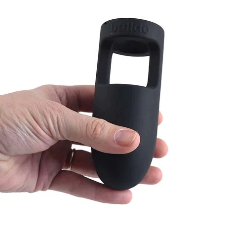 A hand holds the ViBalldo. The ViBalldo looks about as thick as three fingers with a gentle, tapered tip to aid in insertion. | Kinkly Shop