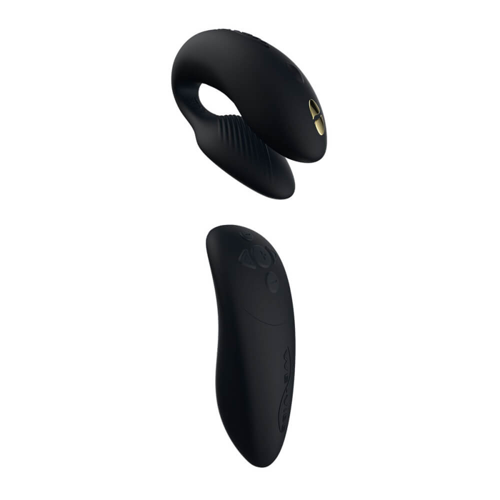 The We-Vibe Chorus U-shaped vibrator next to the squeeze remote that controls it. It has a black/gold color scheme. | Kinkly Shop